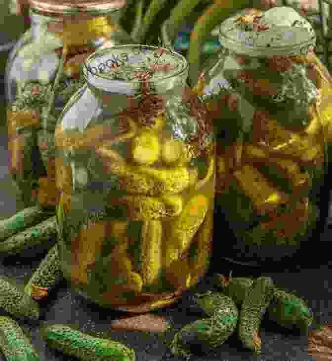 A Close Up Of A Jar Of Pickled Cucumbers THE COMPLETE GUIDE FOR FOOD PRESERVATION: Basic And Simple Ways Of Preserving And Storing Foods In Our Homes