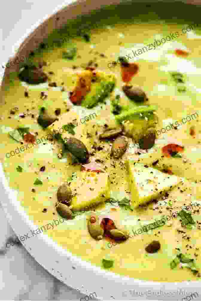 A Warm And Comforting Bowl Of Creamy Avocado Soup, Garnished With A Drizzle Of Olive Oil And A Sprinkle Of Fresh Herbs Superfoods Salads In A Jar: Over 65 Quick Easy Gluten Free Low Cholesterol Whole Foods Recipes Full Of Antioxidants Phytochemicals