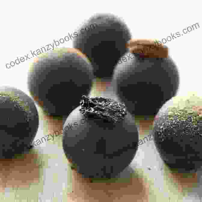 Perfectly Round Ganache Truffles, Their Glossy Exterior Hinting At A Decadent Interior. HOW TO MAKE MOUTH WATERING CANDY FOR FRIENDS AND FAMILY: 55 CANDY RECIPES FUDGE TOFFEE CARAMEL TUFFLES TURTLES CLUSTERS COCONUT FONDANT AND MORE