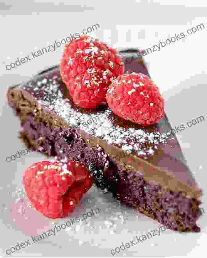 Rich And Decadent Flourless Chocolate Cake Topped With A Velvety Smooth Raspberry Coulis Vegetarian Cookbook: Over 135 Quick And Easy Gluten Free Low Cholesterol Whole Foods Recipes Full Of Antioxidants Phytochemicals