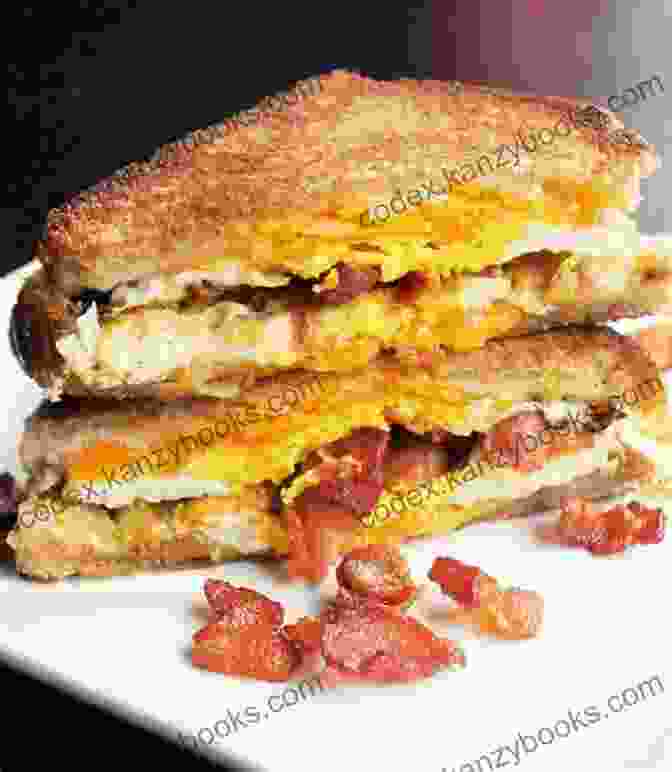 Stacked Waffle Sandwich With Bacon, Fried Egg, And Cheese 36 To Die For Bacon Recipes For Breakfast Lunch Dinner And Dessert